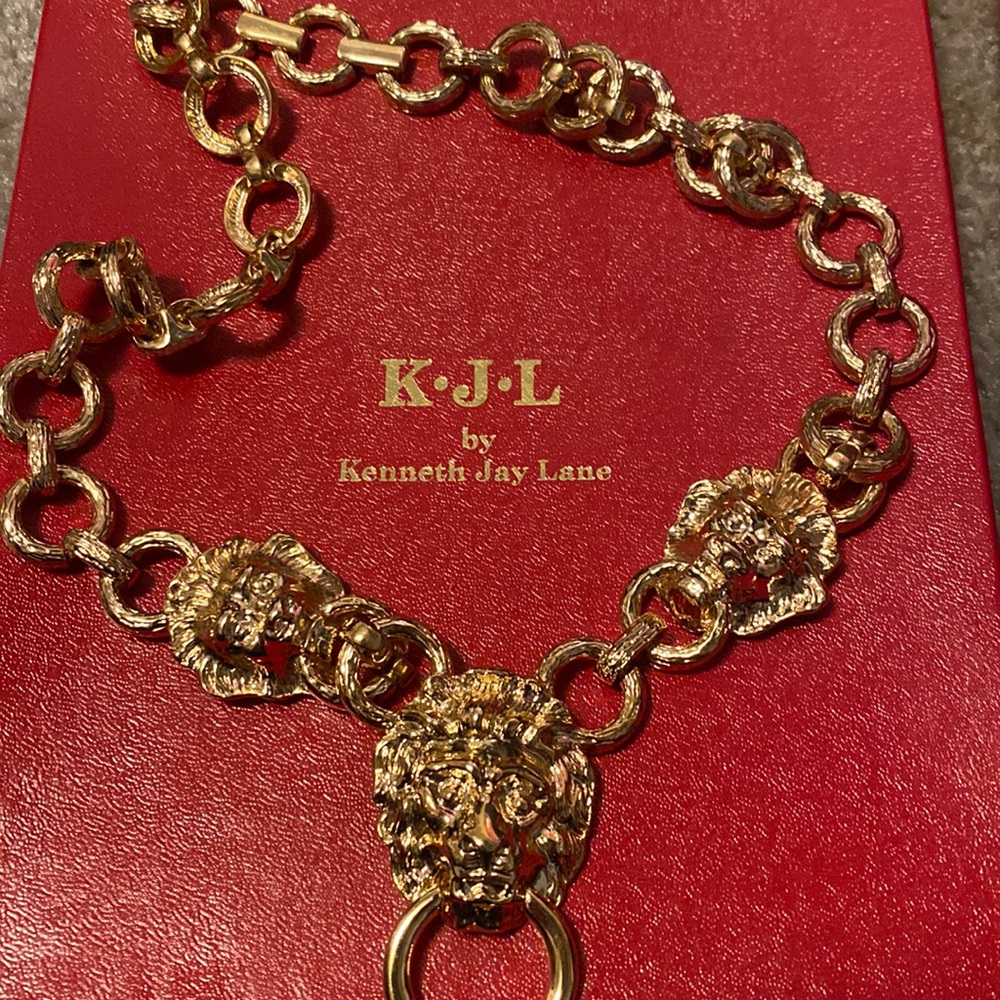 Matching golden earring and necklace set